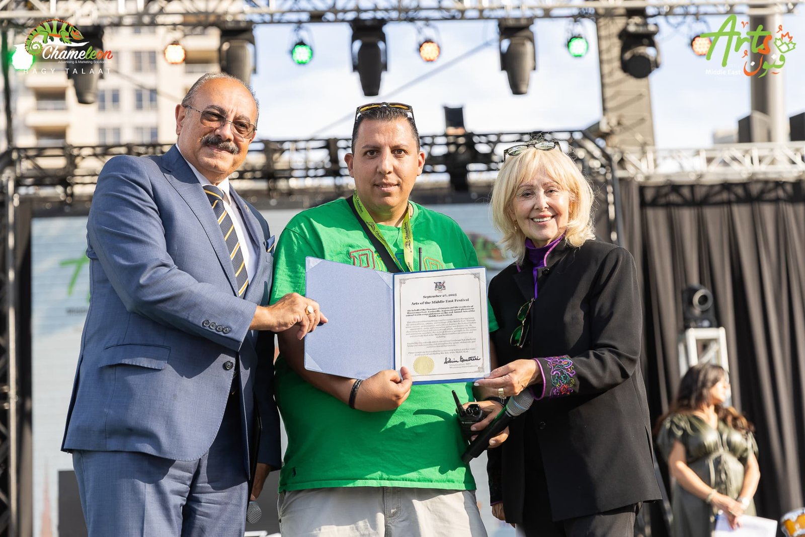 Certificate presentation on stage at AMEF 2