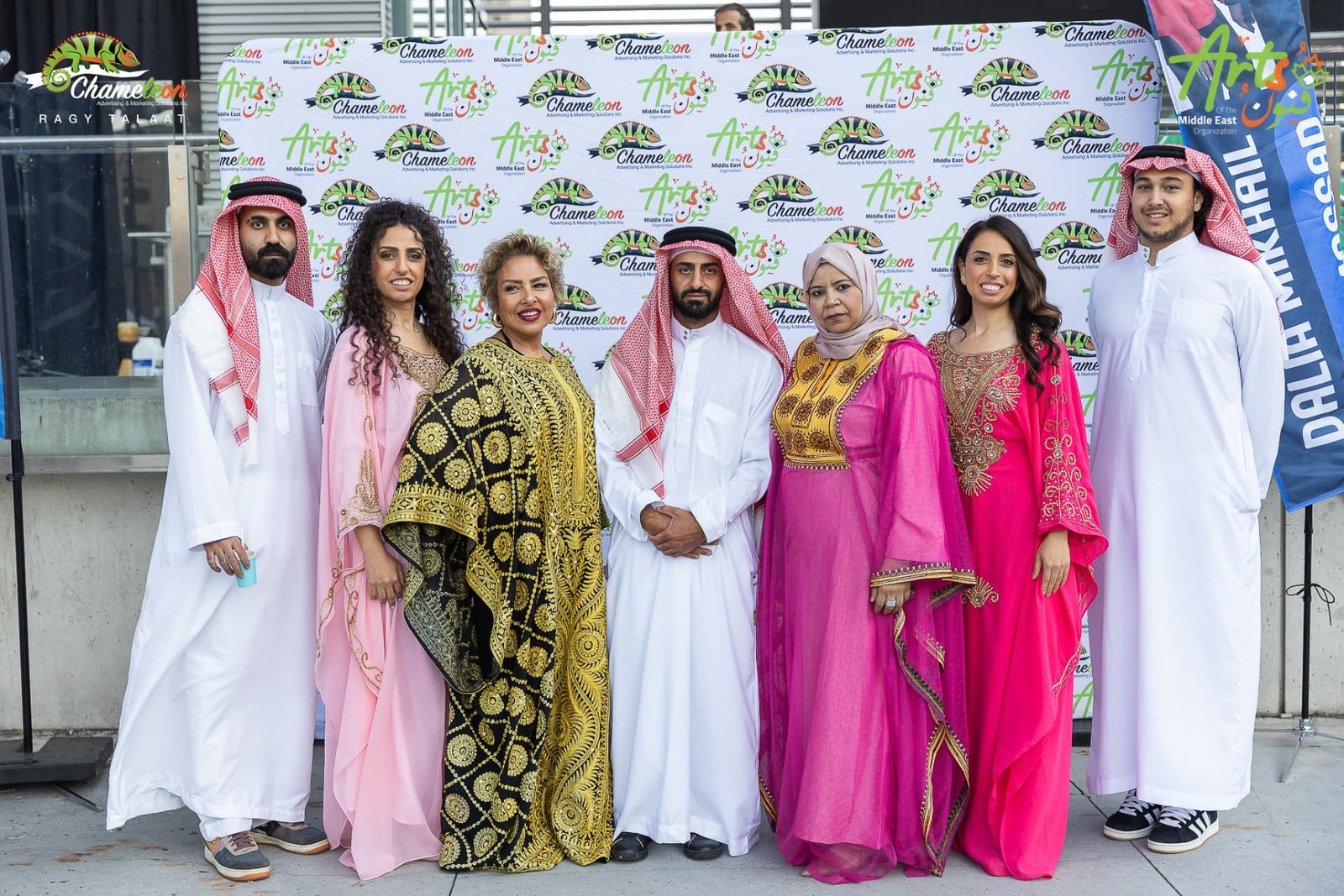Guests in traditional dress at the AMEF 2 photo wall