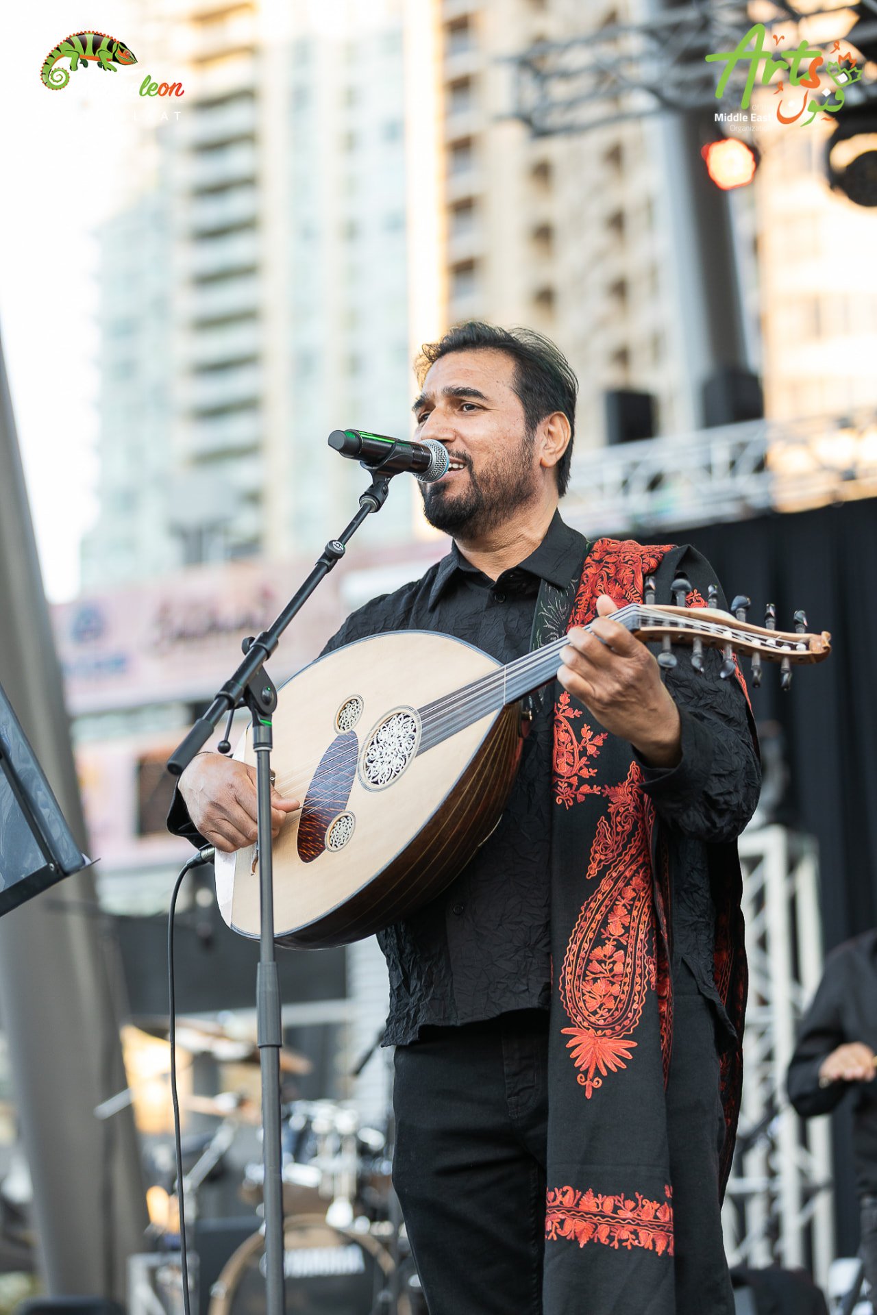 Oud player singing on the AMEF 2 stage