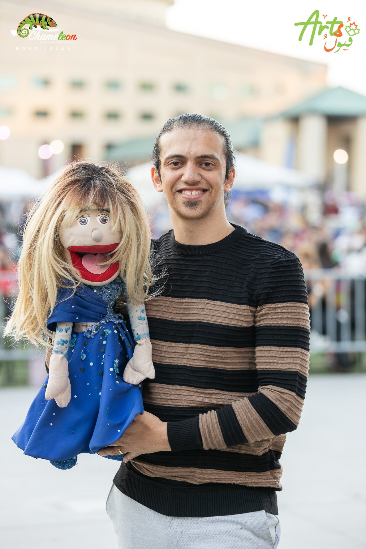 Puppeteer posing with his puppet at AMEF 2
