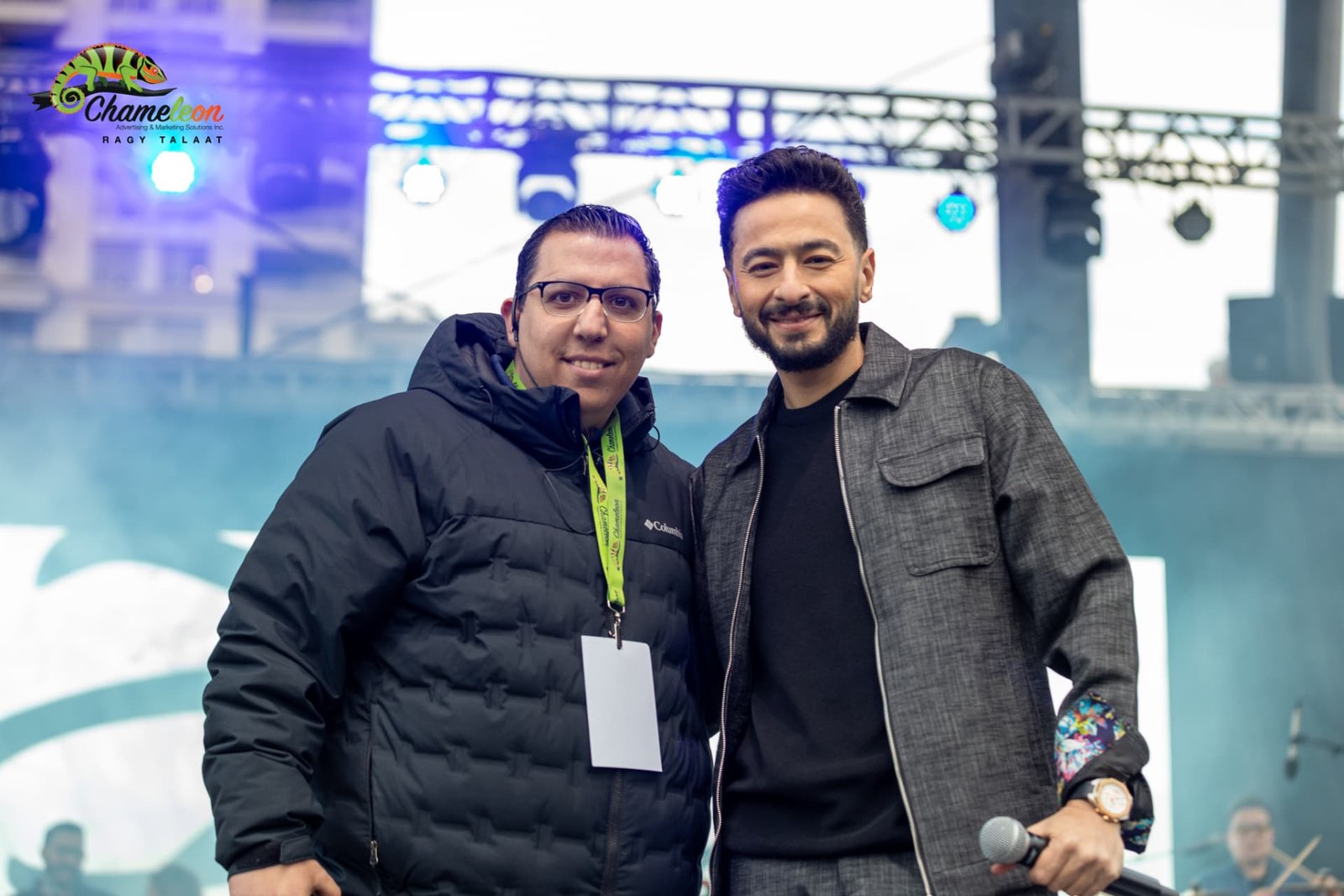 Hamada Helal with a member of the event crew — photo 26