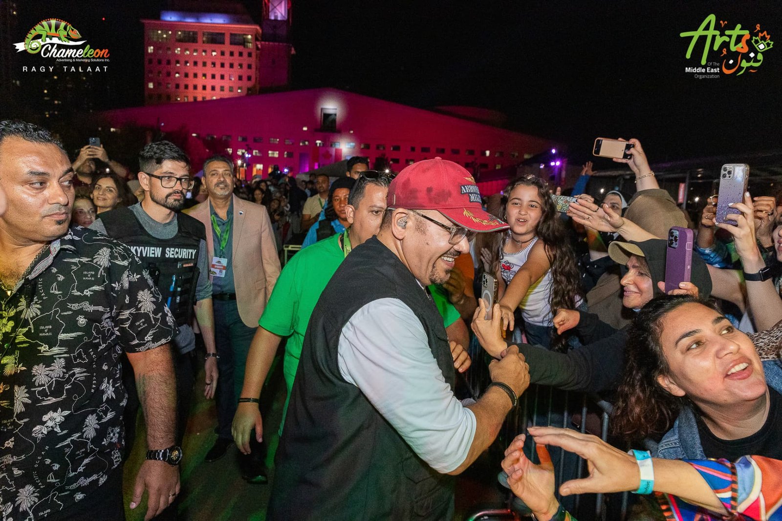 Greeting fans at the barrier after the set